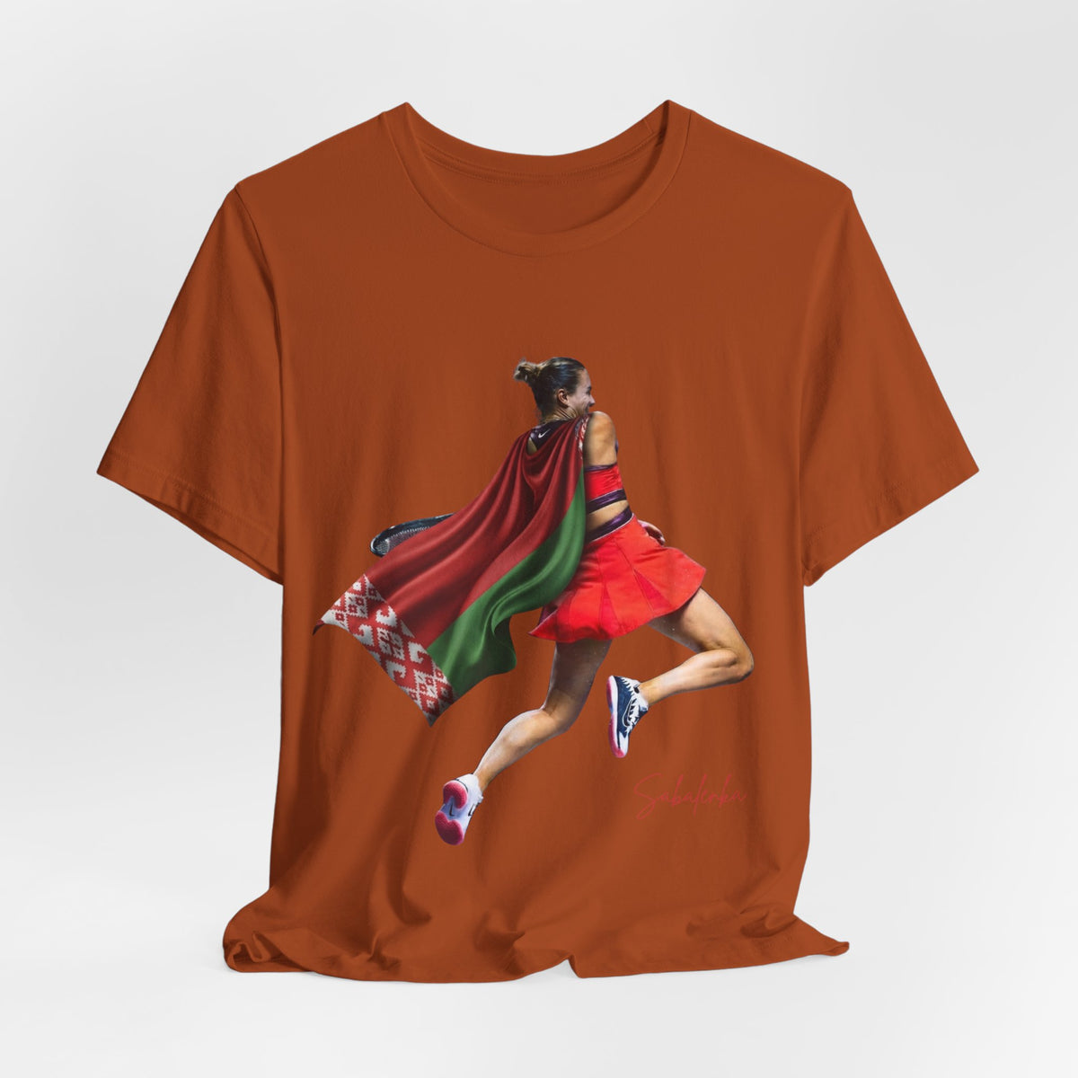 Runner Superhero Sabalenka T‑Shirt — Empowering Female Athlete Tee with Cape Graphic