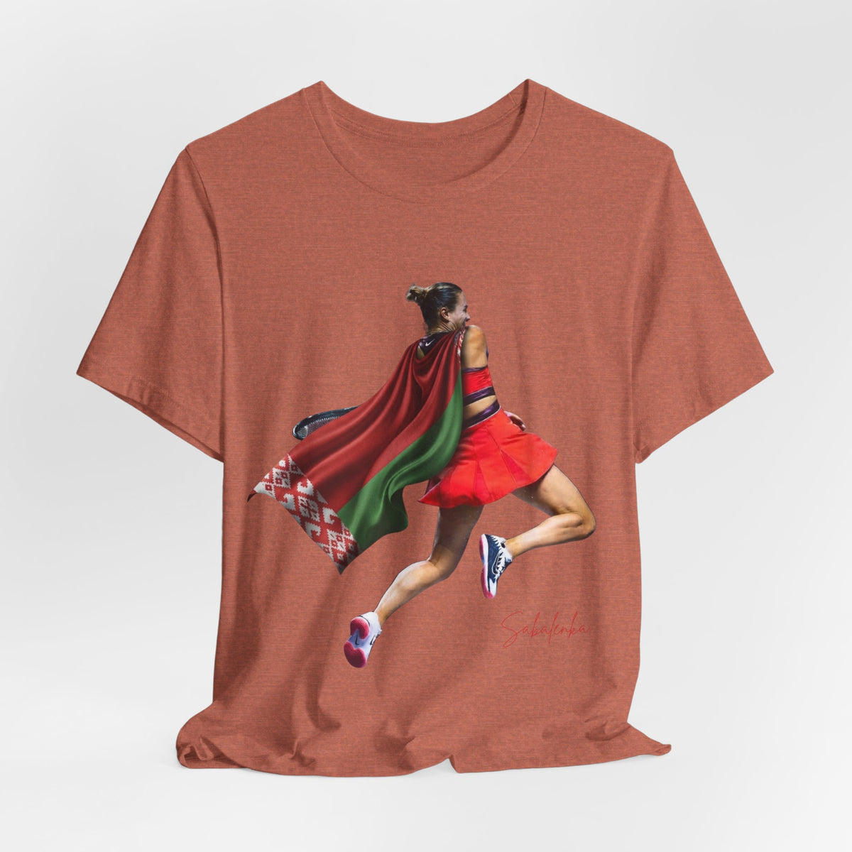 Runner Superhero Sabalenka T‑Shirt — Empowering Female Athlete Tee with Cape Graphic