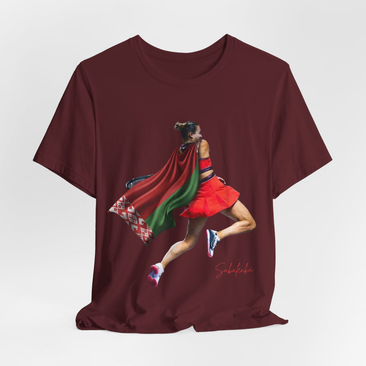Runner Superhero Sabalenka T‑Shirt — Empowering Female Athlete Tee with Cape Graphic