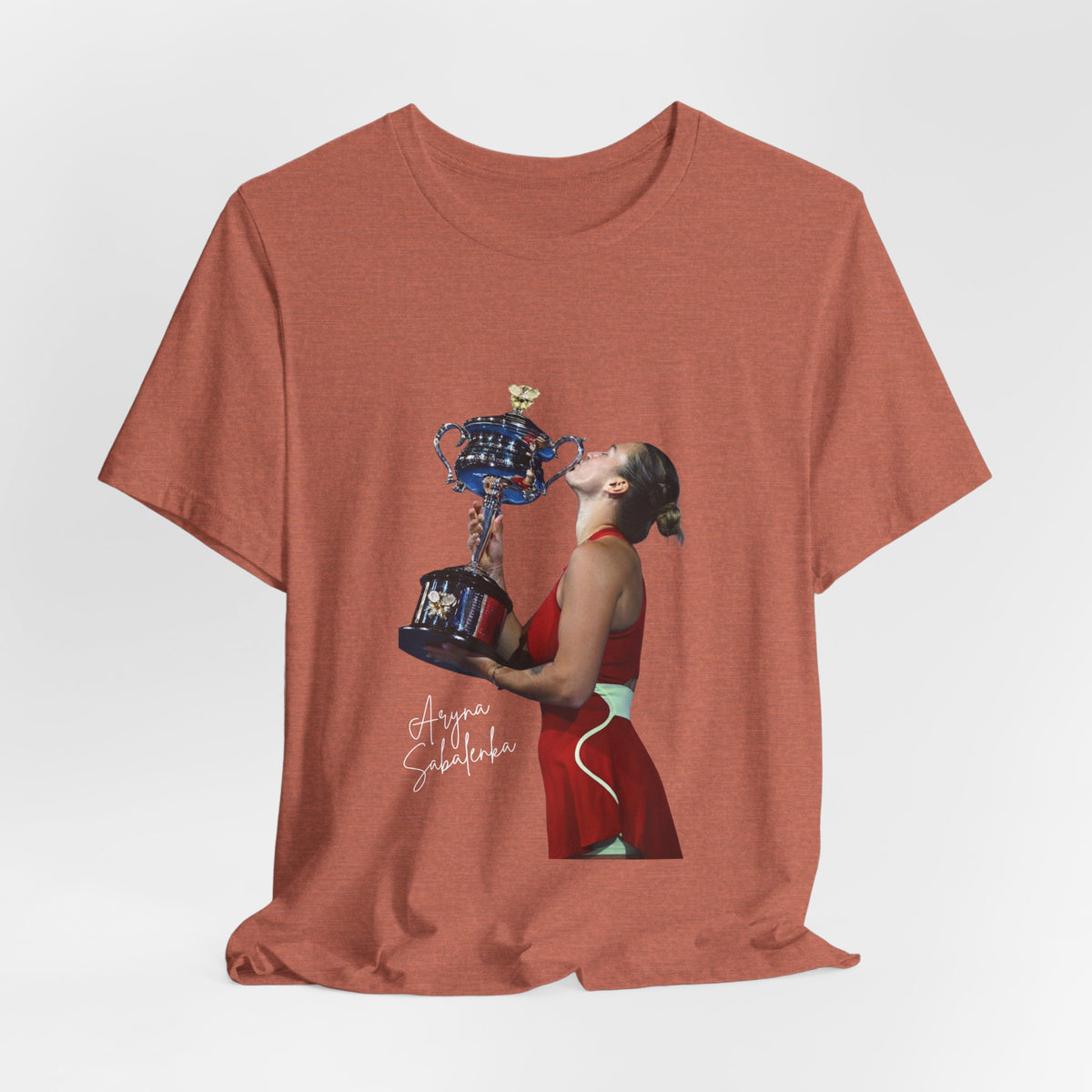 Tennis Champion Sabalenka — Woman Kissing Trophy Graphic T-Shirt