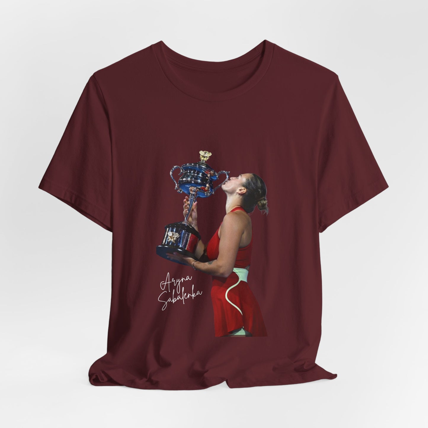 Tennis Champion Sabalenka — Woman Kissing Trophy Graphic T-Shirt