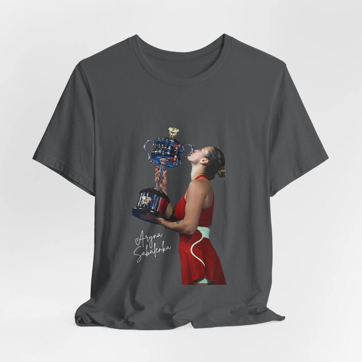 Tennis Champion Sabalenka — Woman Kissing Trophy Graphic T-Shirt