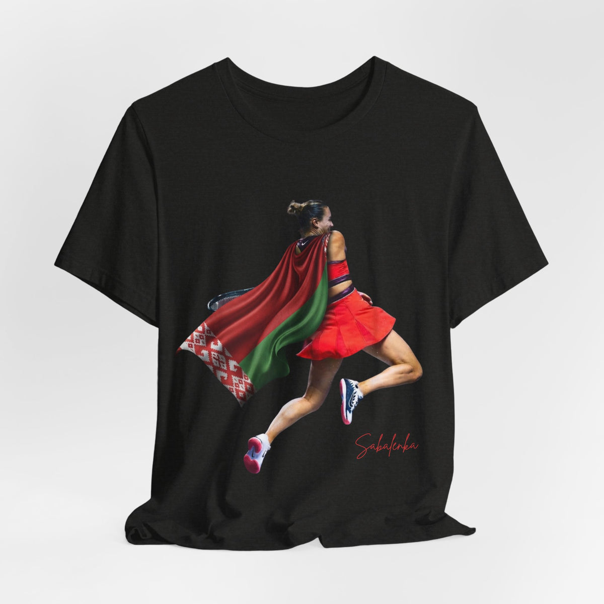 Runner Superhero Sabalenka T‑Shirt — Empowering Female Athlete Tee with Cape Graphic